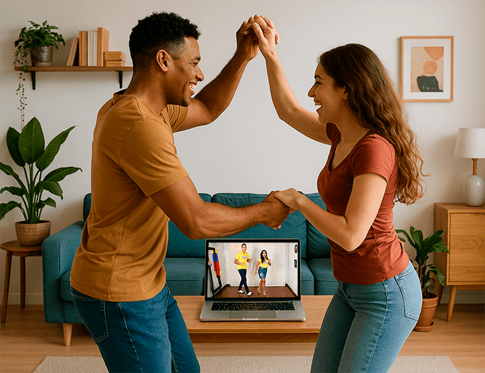 Pareja bailando con portátil